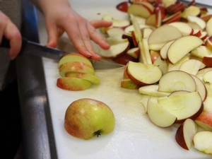Slicing local apples from North Star Orchards for the pie